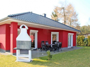 rotes Ferienhaus im Fischerdorf in Kröslin